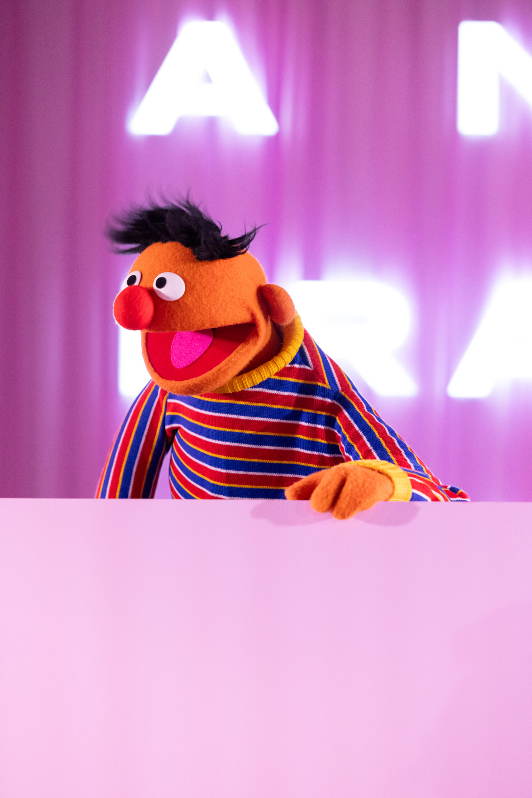 Bert and Ernie onstage receiving award in Miami Beach