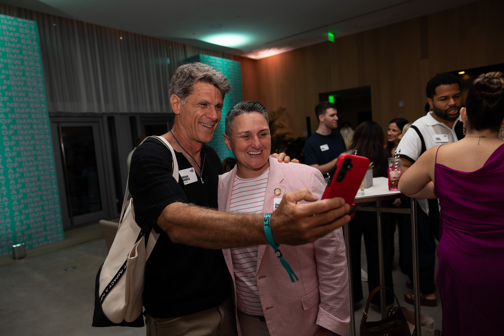 CNN Heroes taking a selfie at the Elevate Prize Make Good Famous Summit in Miami 2024